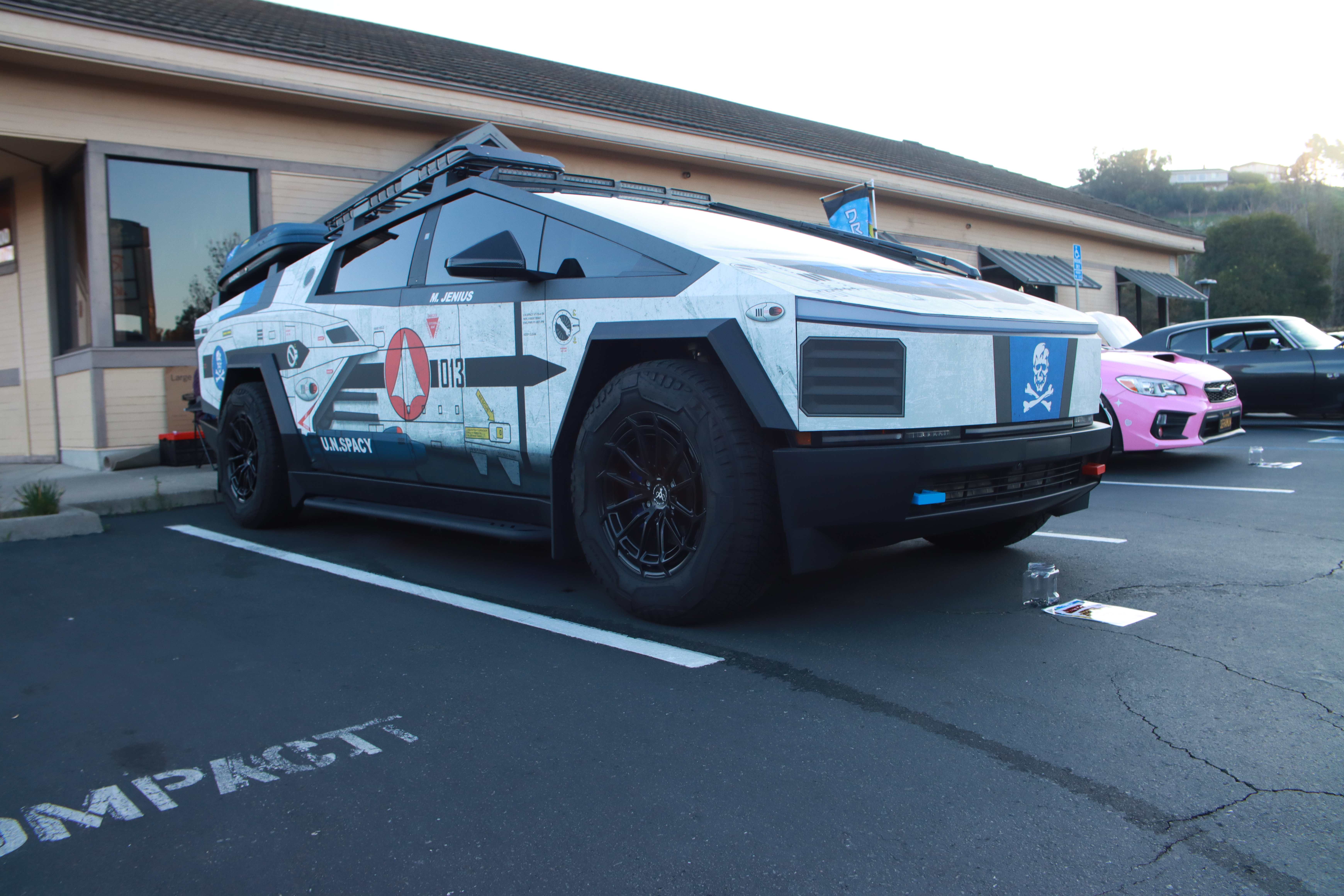 Tesla Cybertruck U.N. SPACY wrap - side angle showing detailed graphics