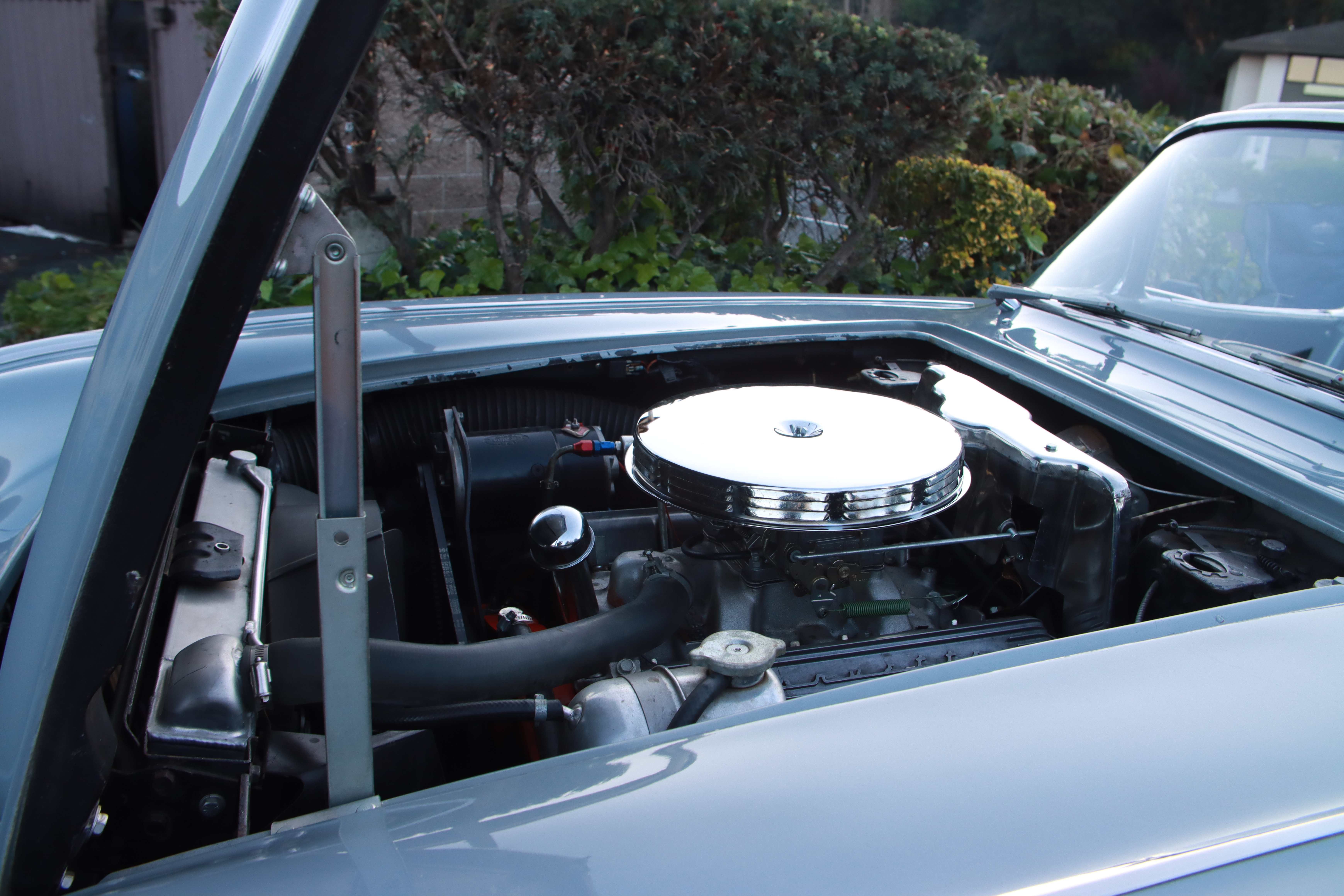 Classic chrome engine bay with polished air cleaner and valve covers