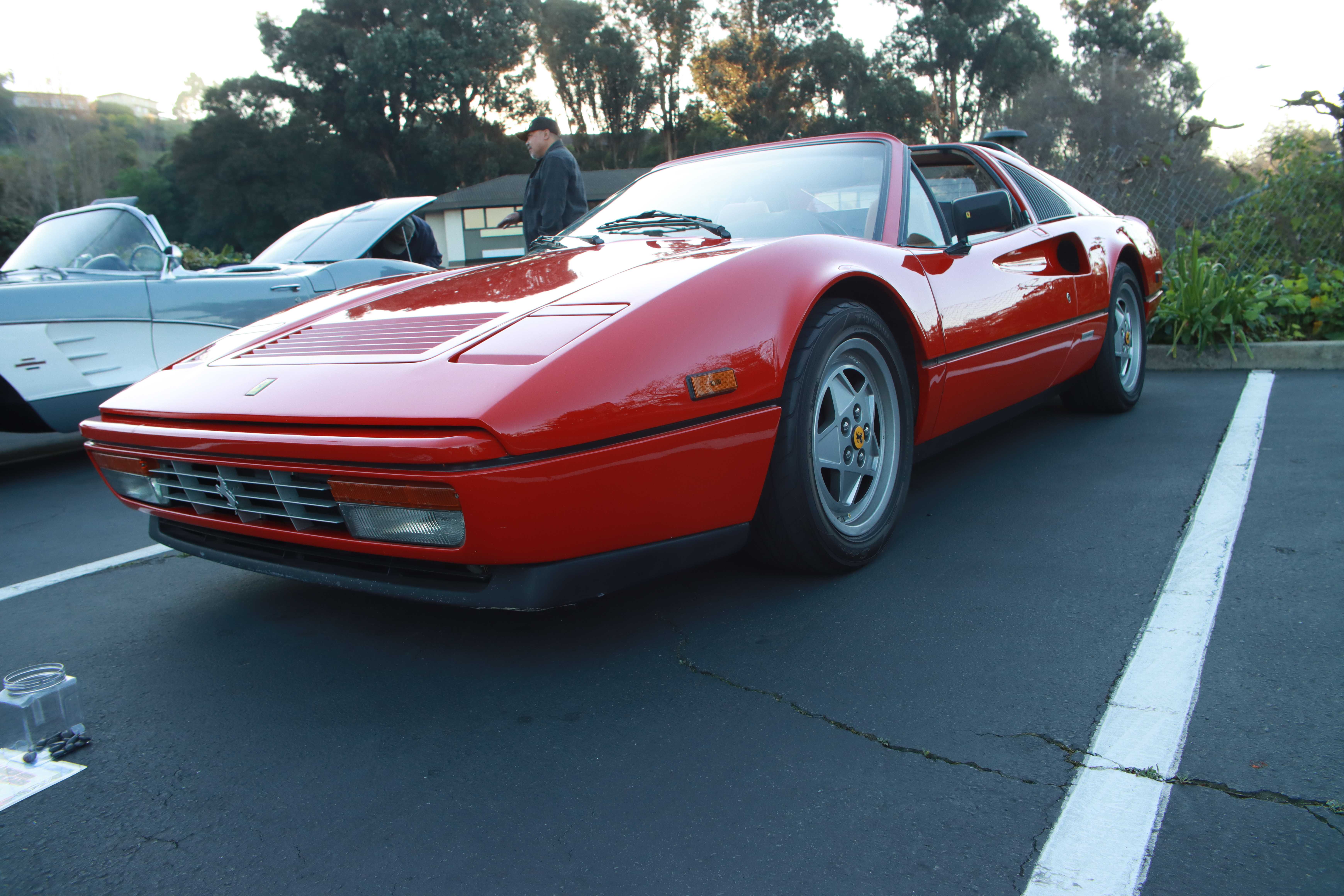 Red Ferrari 328 GTS - front three-quarter view on parking lot