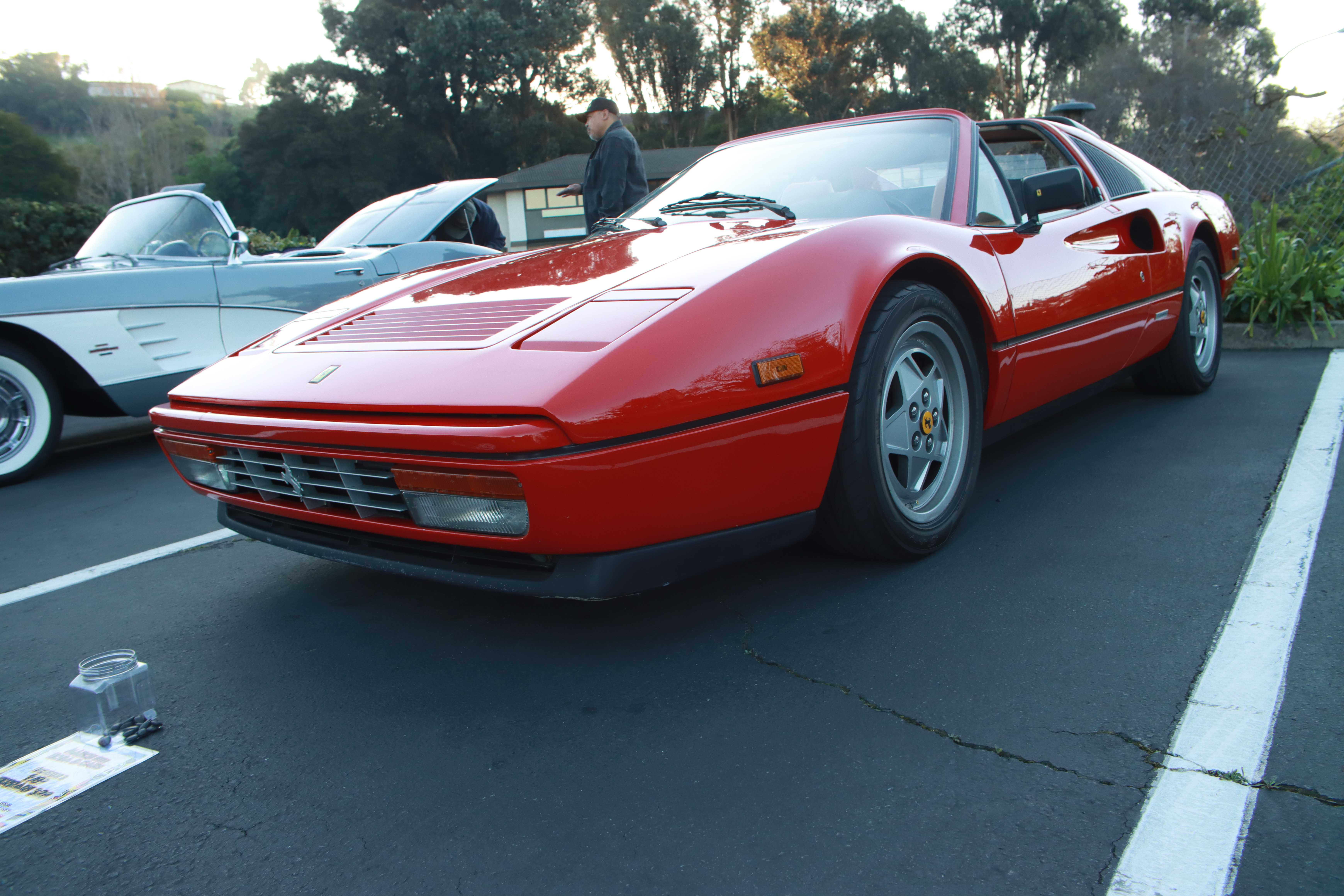 1961 Chevrolet Corvette in silver blue - front angle with hood open